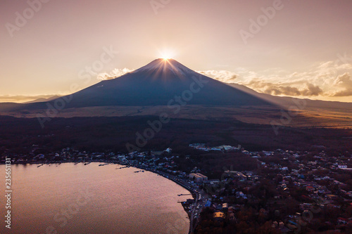 Fuji Diamond at Lake Yamanaka in winter season. Diamond Fuji is the name given to the view of the sun meeting the summit of the mountain, Japan photo