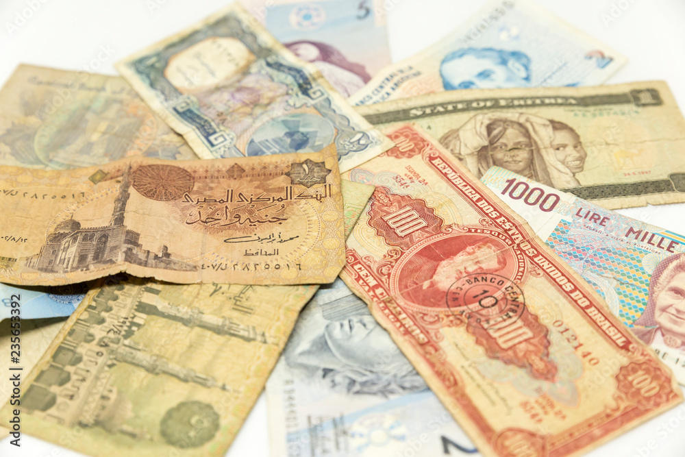 A bunch of bank notes from different countries A bunch of bank notes from different countries