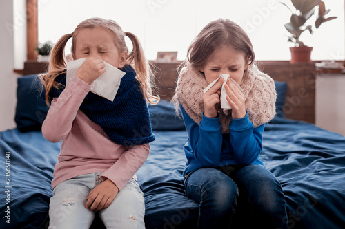 Pretty kids sneezing photo