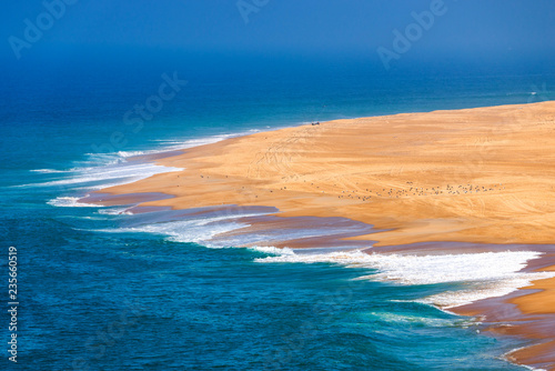 Scenic view of surf beach and ocean near Nazare Portugal