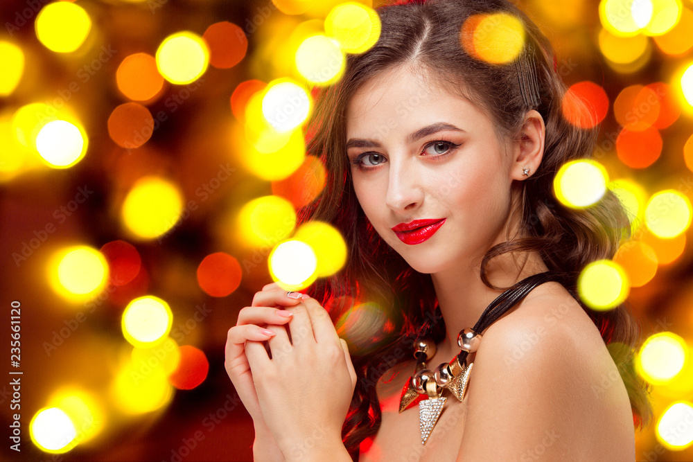Beautiful girl and shiny background with lights . Celebration of New Year and Christmas, white wine and excitement