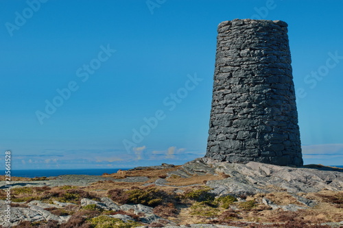 The old stone watch tower on the west coast of Norway © Ruslans
