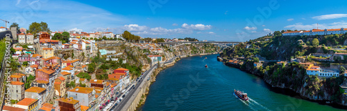 Porto, Portugal old town ribeira aerial promenade view with colorful houses, Douro river, panoramic view © rostovdriver