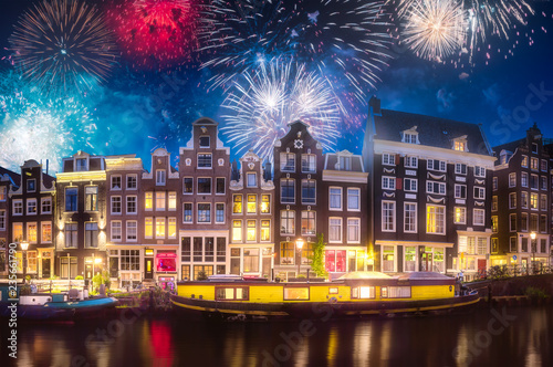 River, traditional old houses and boats, Amsterdam