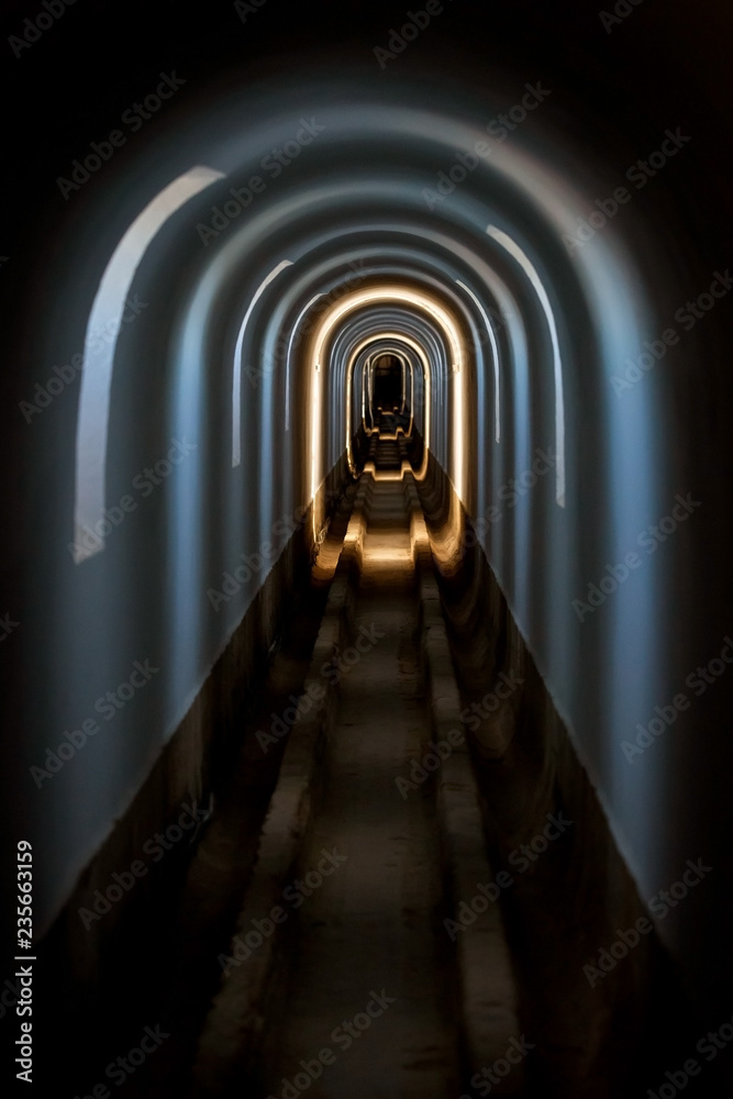 Arc tunnel, various color light inside.