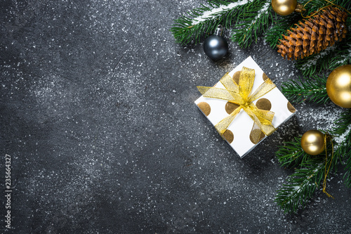 Christmas background - Gold and silver decorations and present b