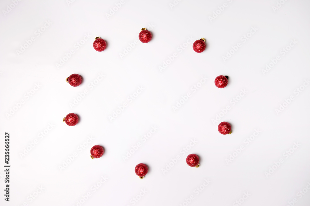 Christmas composition. Christmas red balls on a white background. Flat lay, top view Christmas composition. Christmas red balls on a white background. Flat lay, top view
