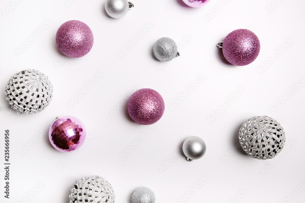 Christmas composition. Pink and silver decor on a white background. Flat lay, top view