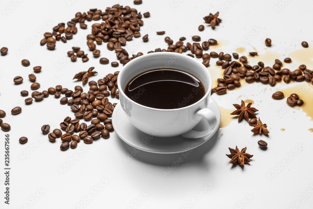 Coffee cup and beans on a white background Coffee cup and beans on a white background