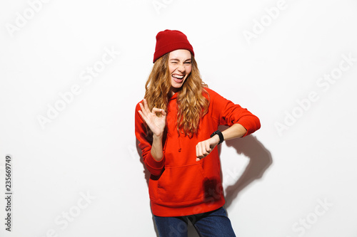Portrait of an excited girl wearing hoodie