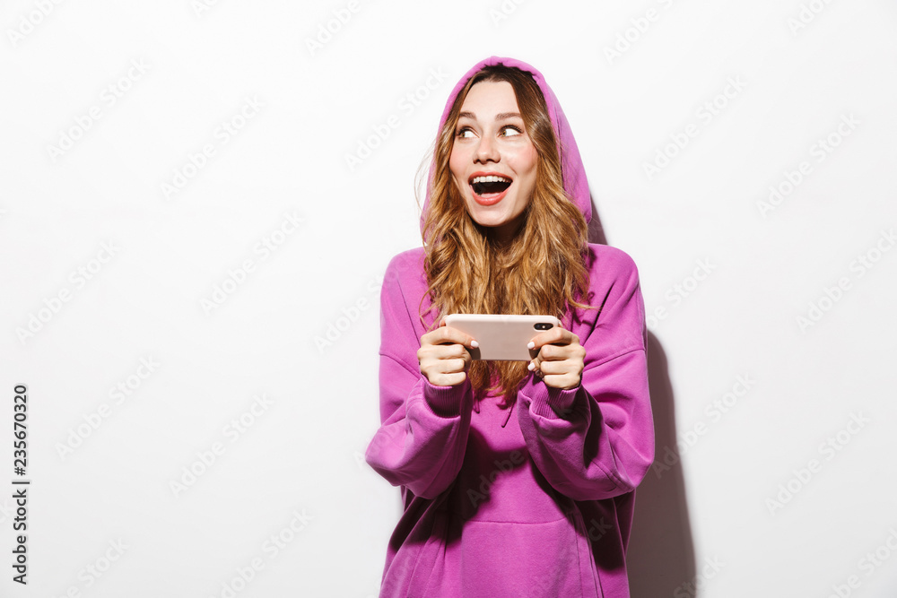 Portrait of an excited girl wearing hoodie Portrait of an excited girl wearing hoodie