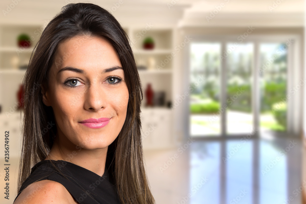 Close up beautiful woman smiling in home. Blurry background. Close up beautiful woman smiling in home. Blurry background.