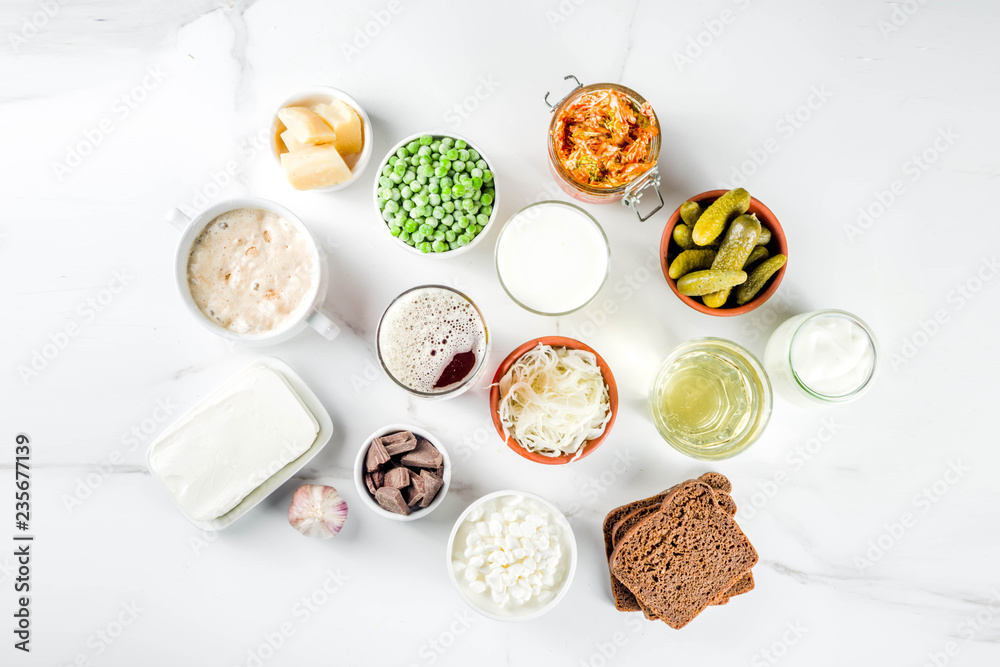Super Healthy Probiotic Fermented Food Sources, drinks, ingredients, on white marble background copy space top view - obrazy, fototapety, plakaty 