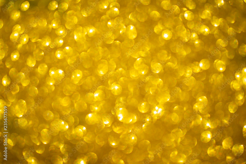 Golden bokeh background with copy space for poster at christmas Golden bokeh background with copy space for poster at christmas