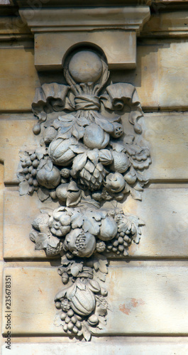 Architectural details on building, stone carving, aesthetic frills. photo