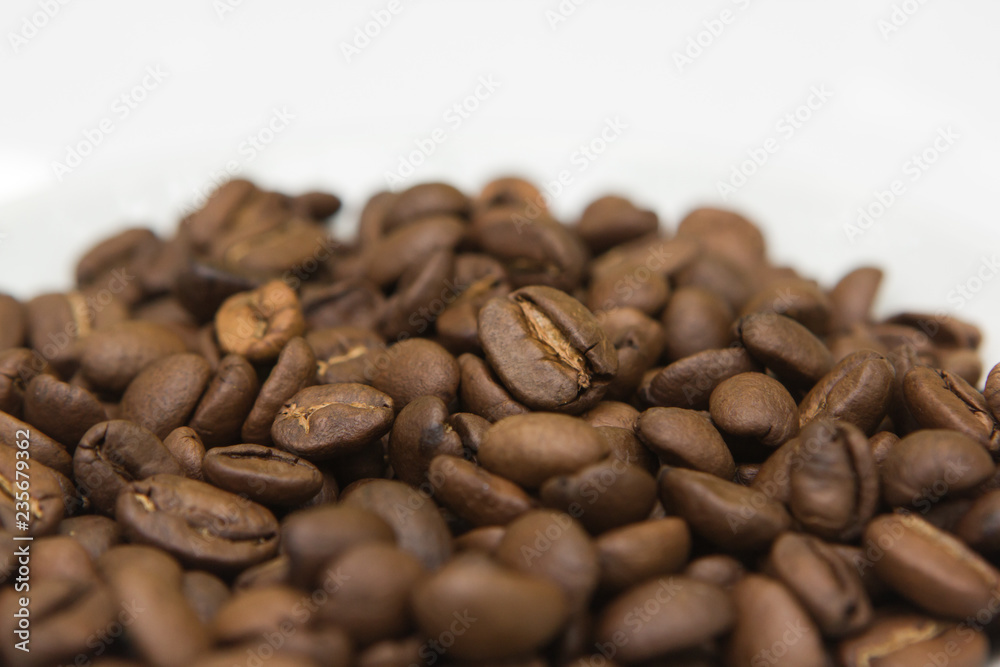 top view cup with coffee seeds and beans isolated on white backgorund. tasty morning drinks and beverages. top view cup with coffee seeds and beans isolated on white backgorund. tasty morning drinks and beverages.