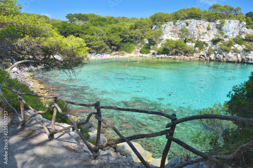 Turquoise water in bay Cala Macarella on Menorca island in Spain