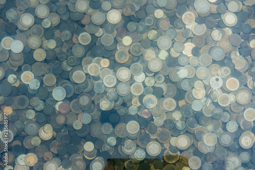 Coins in a Wishing Well photo