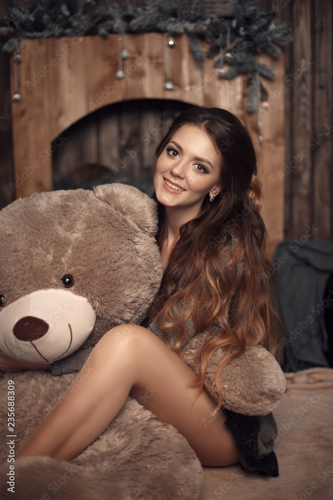 Pretty Cute Brunette Girl Posing With Big Teddy Bear On The Floor In Cozy Comfortable Interior Home Stock Photo Adobe Stock