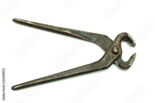 old iron nail pliers close up, on white background