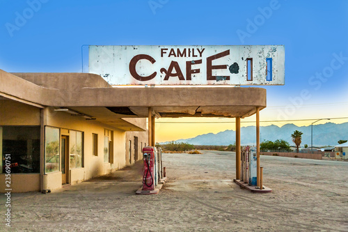 Фотография abandoned petrol station in the desert village of Desert Center in sunset