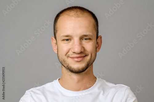 Portrait of smiling young man looking at camera
