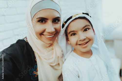 Photography Happy Muslim Mom with Little Son Making Selfie.
