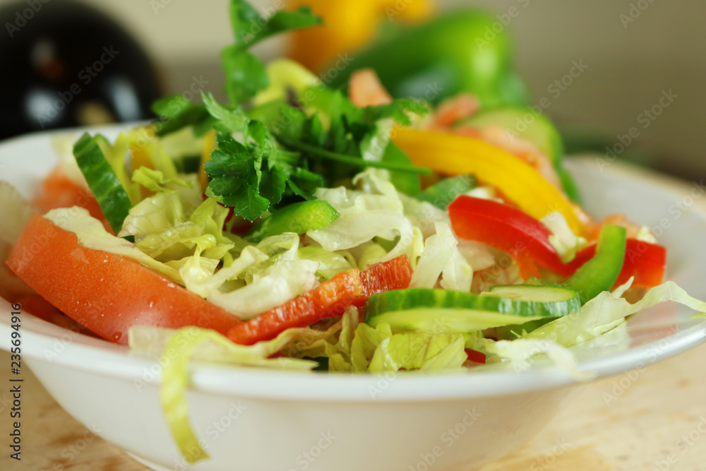 Fresh vegetable salad with paprika, cucumber, tomato, parsley and spices. Fresh vegetable salad with paprika, cucumber, tomato, parsley and spices.