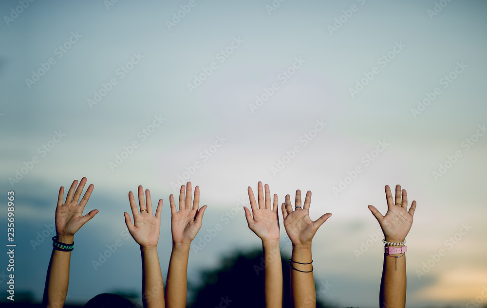 The hands of young people show joy. Happy in paradise Teamwork concept And there is a copy space. The hands of young people show joy. Happy in paradise Teamwork concept And there is a copy space.