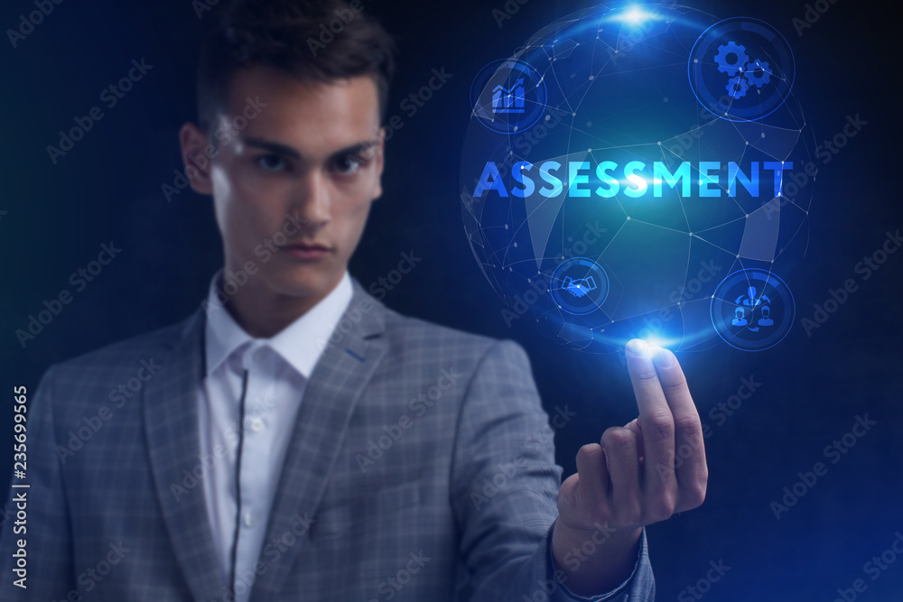 The concept of business, technology, the Internet and the network. A young entrepreneur working on a virtual screen of the future and sees the inscription: assessment The concept of business, technology, the Internet and the network. A young entrepreneur working on a virtual screen of the future and sees the inscription: assessment