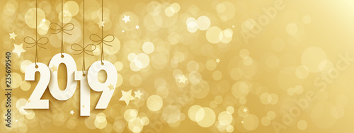 2019 on gold background with bokeh lights