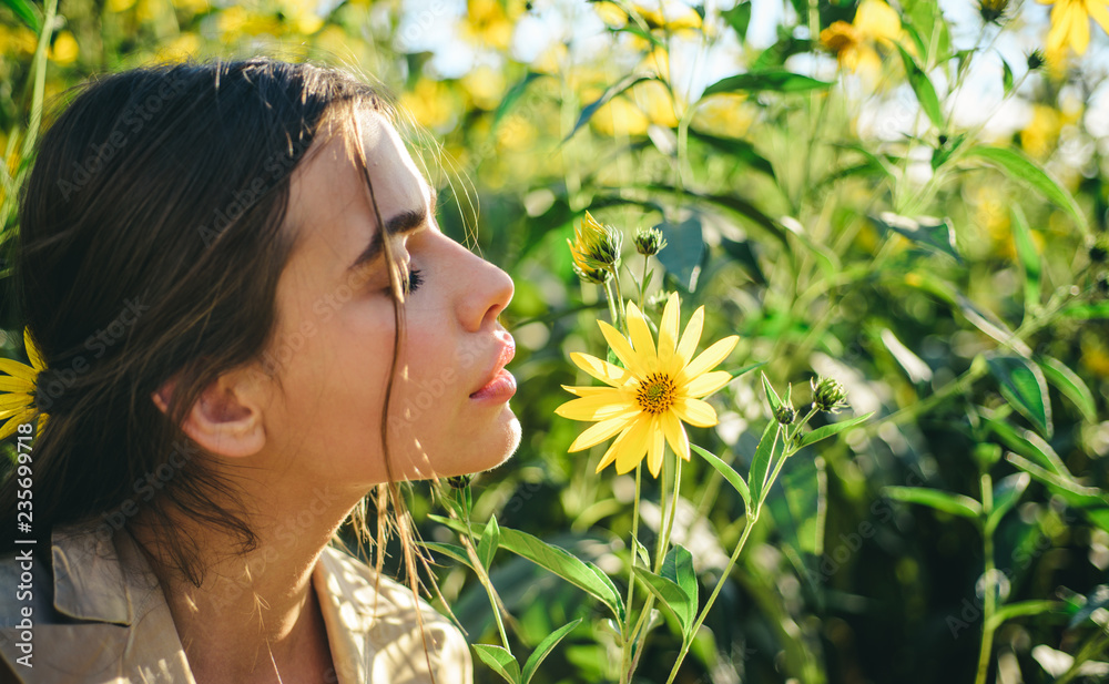 Girl wiht Flower. Spring sensual woman. Nature girl concept. Yellow spring mood. Girl wiht Flower. Spring sensual woman. Nature girl concept. Yellow spring mood.