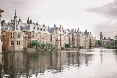 Amazing Binnenhof Palace in The Hague (Den Haag). Dutch Parliament buildings. Famous castle with fountains in front of it. The Netherlands, The Hague. 