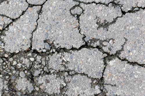 Fotografija the texture of the old asphalt with crack