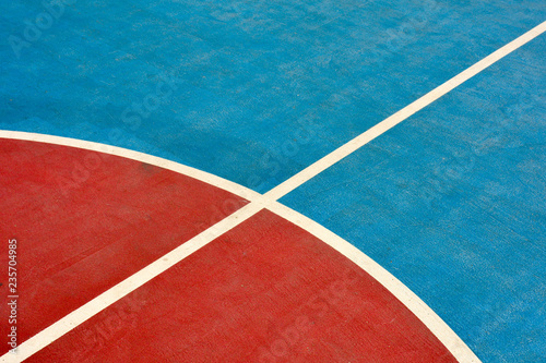 closeup blue and red basketball court