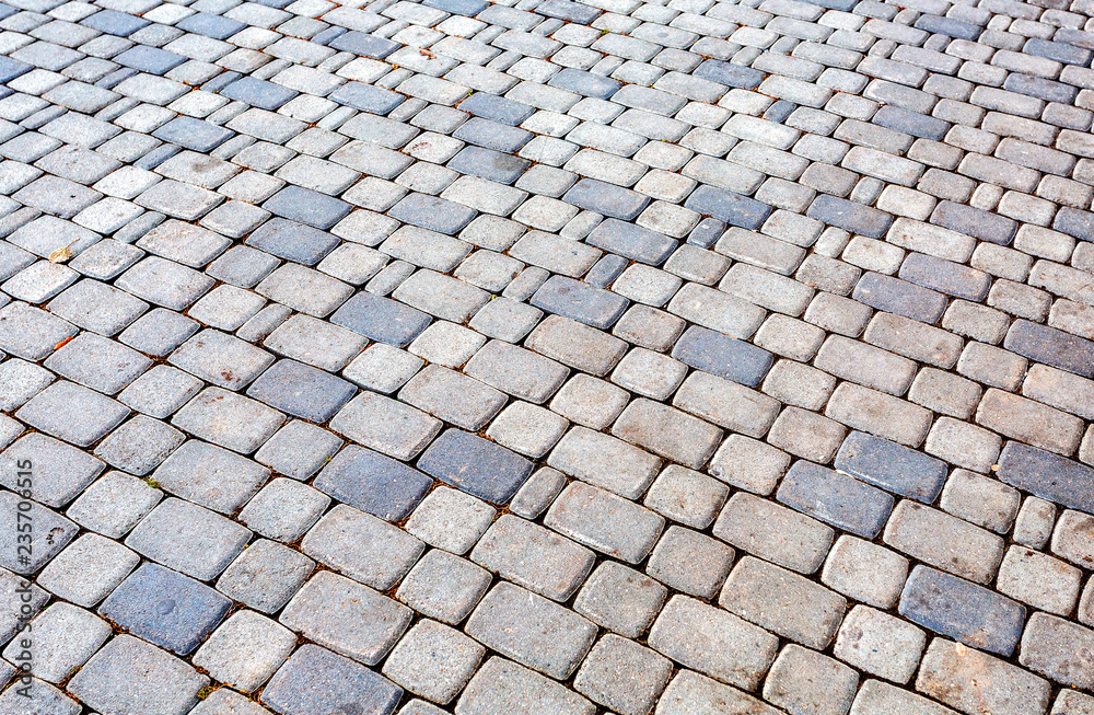 Grey paving stones as background texture