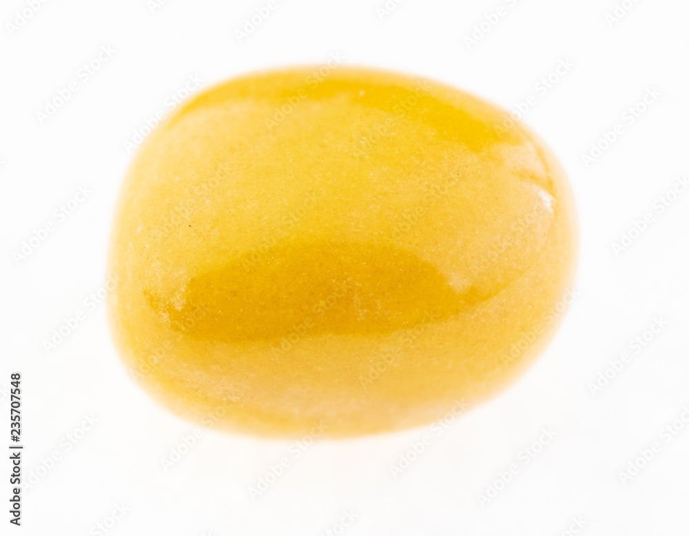 polished yellow jasper stone on white