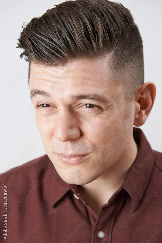 Obraz premium Man With Poor Eyesight Squinting Into Distance