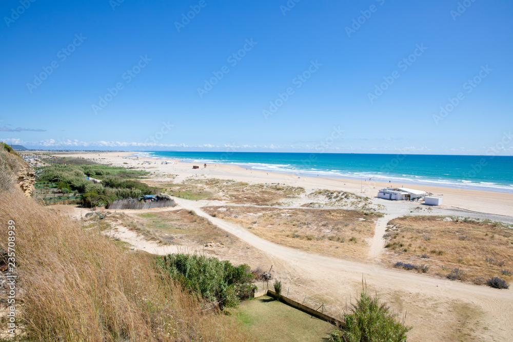 landscape of large Bateles Beach, from top, in Conil de la Frontera (Cadiz, Andalusia, Spain)
