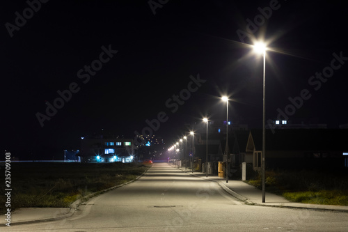 village street with modern LED streetlights at night © Milan Noga reco