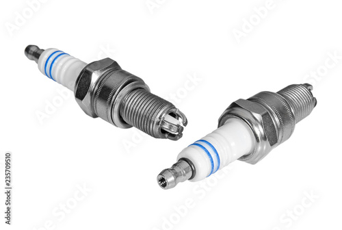 Car spark plugs on white background