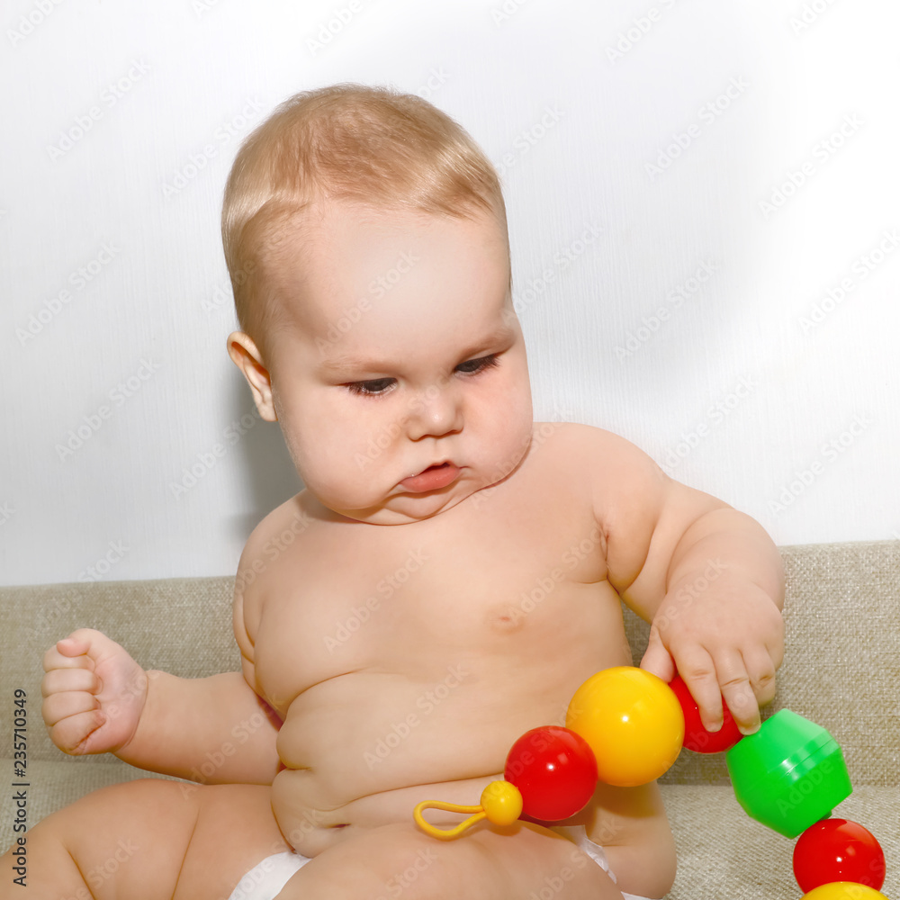 Portrait of a cute baby, facial expression and emotions Portrait of a cute baby, facial expression and emotions