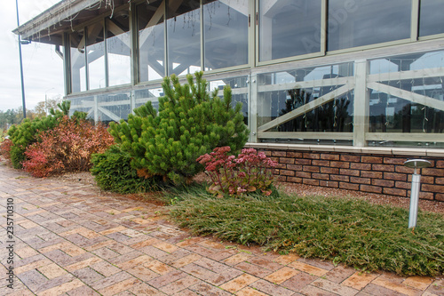 modern restaurant with tile pavement and landscape design