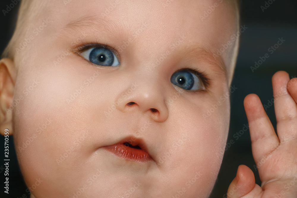 Portrait of a cute baby, facial expression and emotions Portrait of a cute baby, facial expression and emotions