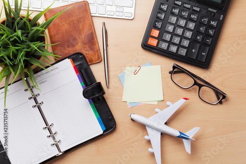 Business trip concept. Accessories on desk table