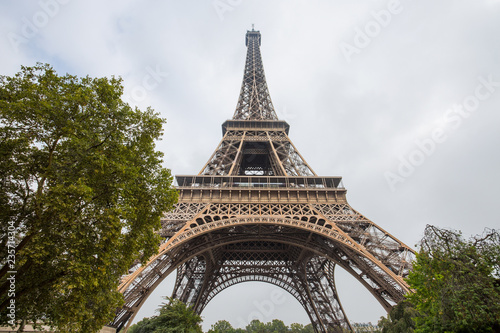 View of Eiffel Tower in a day of a cloudy sky in Paris, France