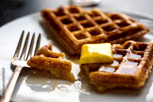 Close up of butter melting on yeasted waffles
 photo