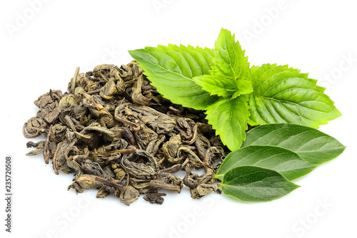 Green tea with fresh leaf and mint isolated.