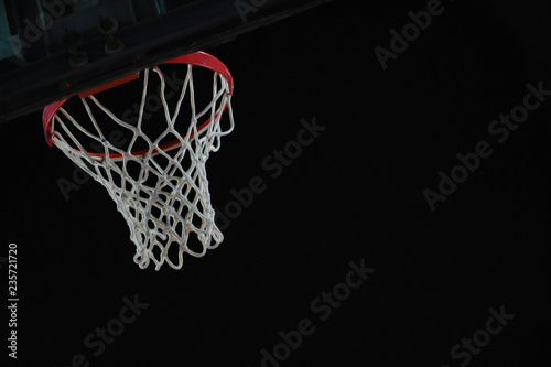 basketball hoop on black background © Albert