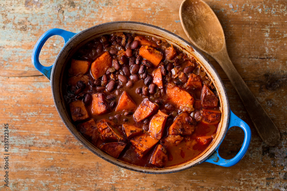 Overhead view of baked beans with sweet potatoes and chipotle Overhead view of baked beans with sweet potatoes and chipotle